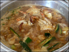 Crab soup boiling